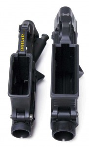 A side by side bottom view visual comparison of the MEGA ARMS MA-TEN 308AR Receiver Set for the .308 Winchester Cartridge and a Spikes Tactical AR15 Receiver Set for .223 Remington Cartridge - 308 AR15 , AR15 vs AR-10 308AR AR308